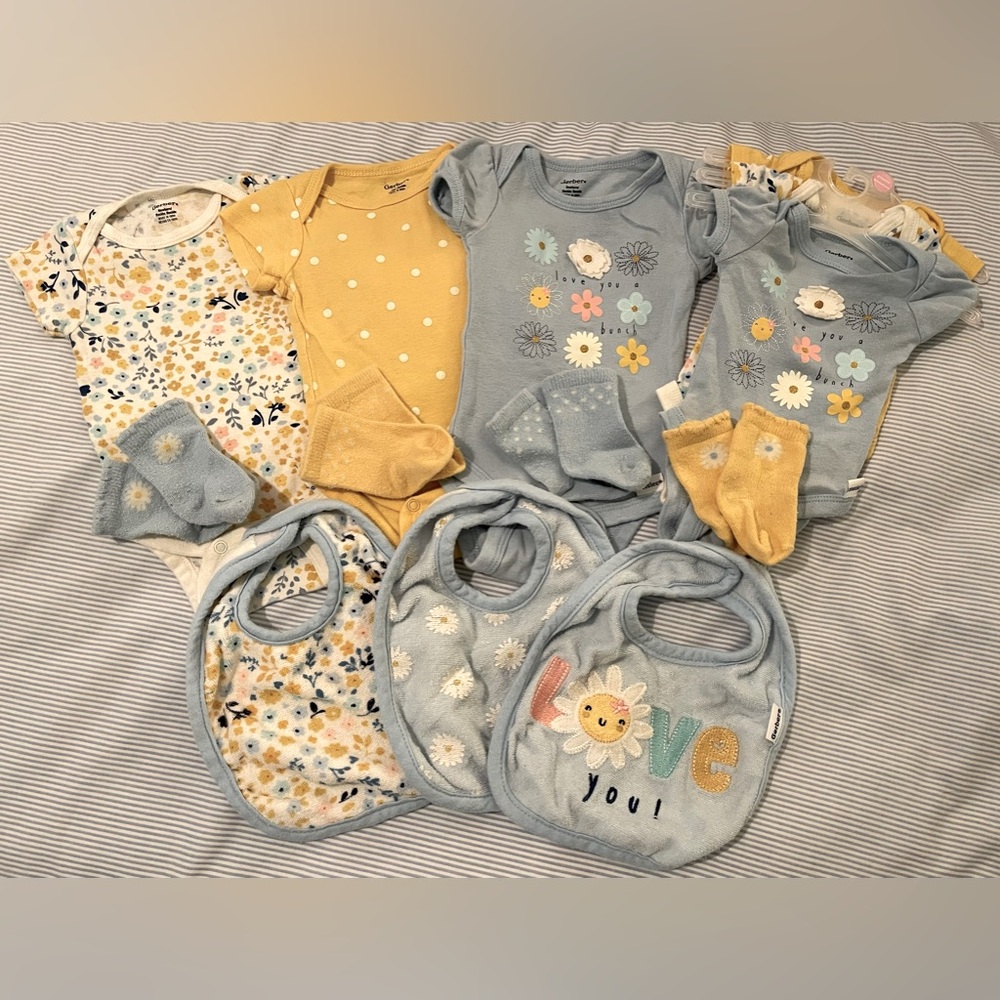 Bundle of baby girl 6 onesies, 4 socks and 3 bibs size PREEMIE and NEWBORN